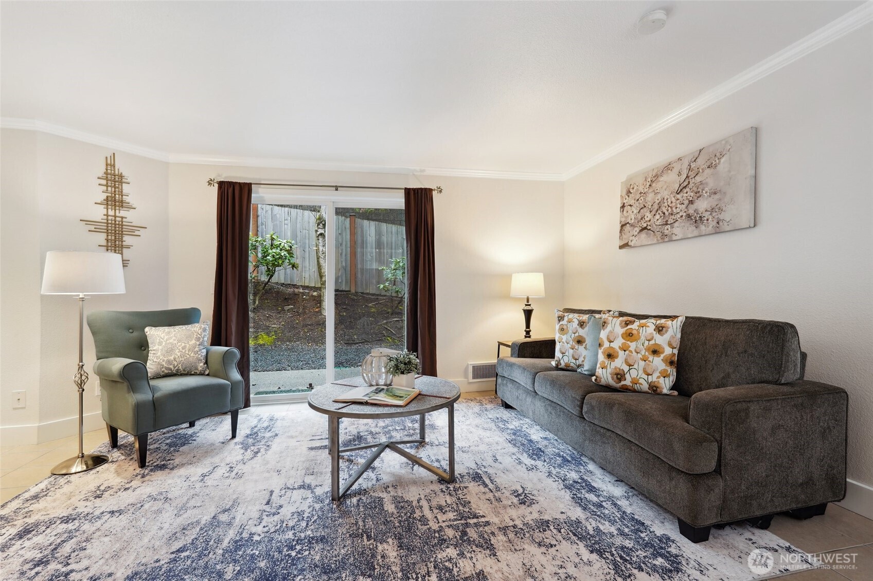 18910 Bothell Everett Highway, Unit K2 Bothell, WA 98012 - Photo 10 of 34 a living room with furniture and a large window