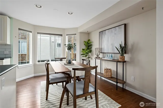 a view of a livingroom with furniture and window