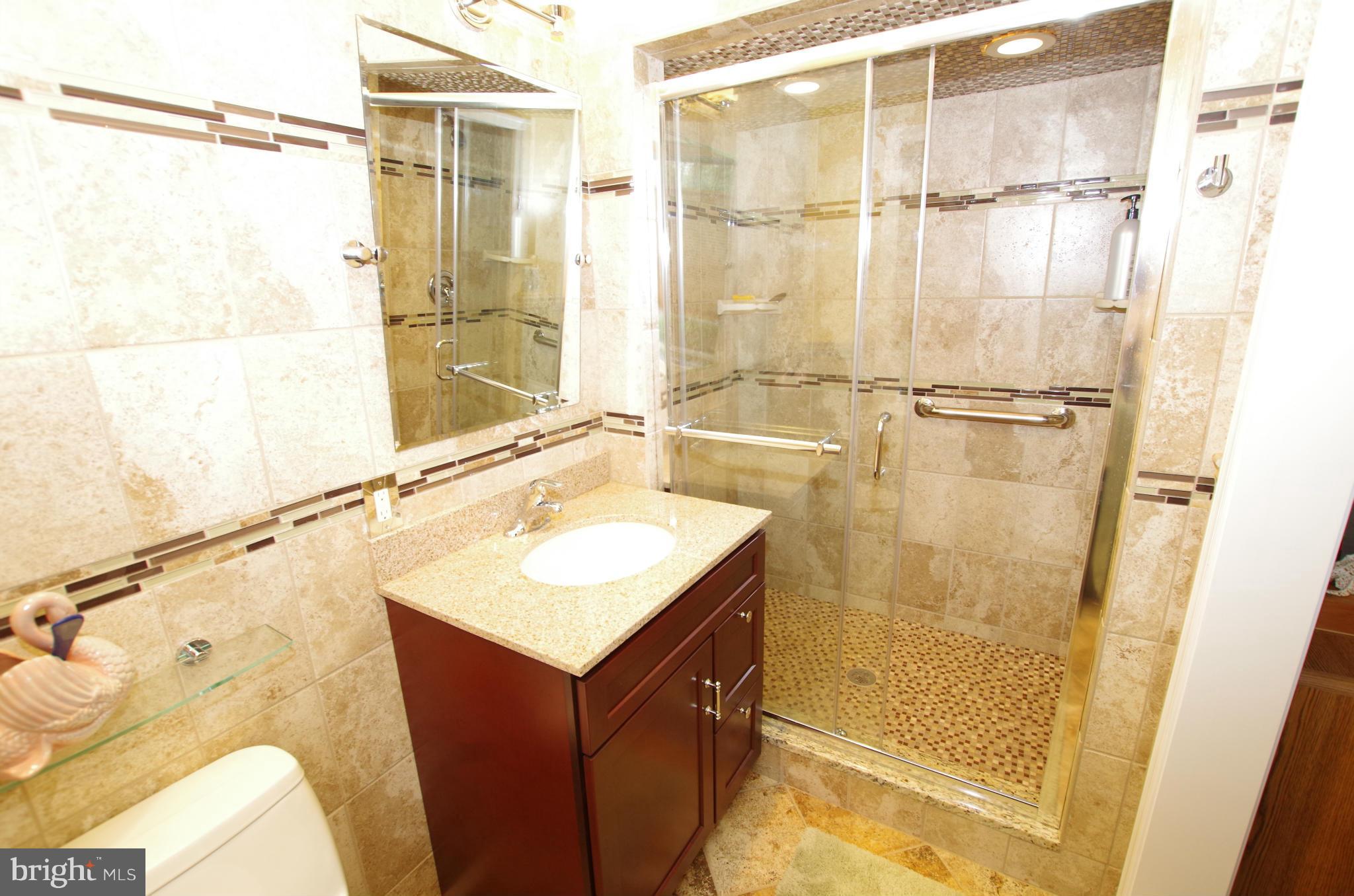 1711 Gayfields Drive Silver Spring, MD 20906 - Photo 14 of 30 Walk-in Shower with Ceramic Tile