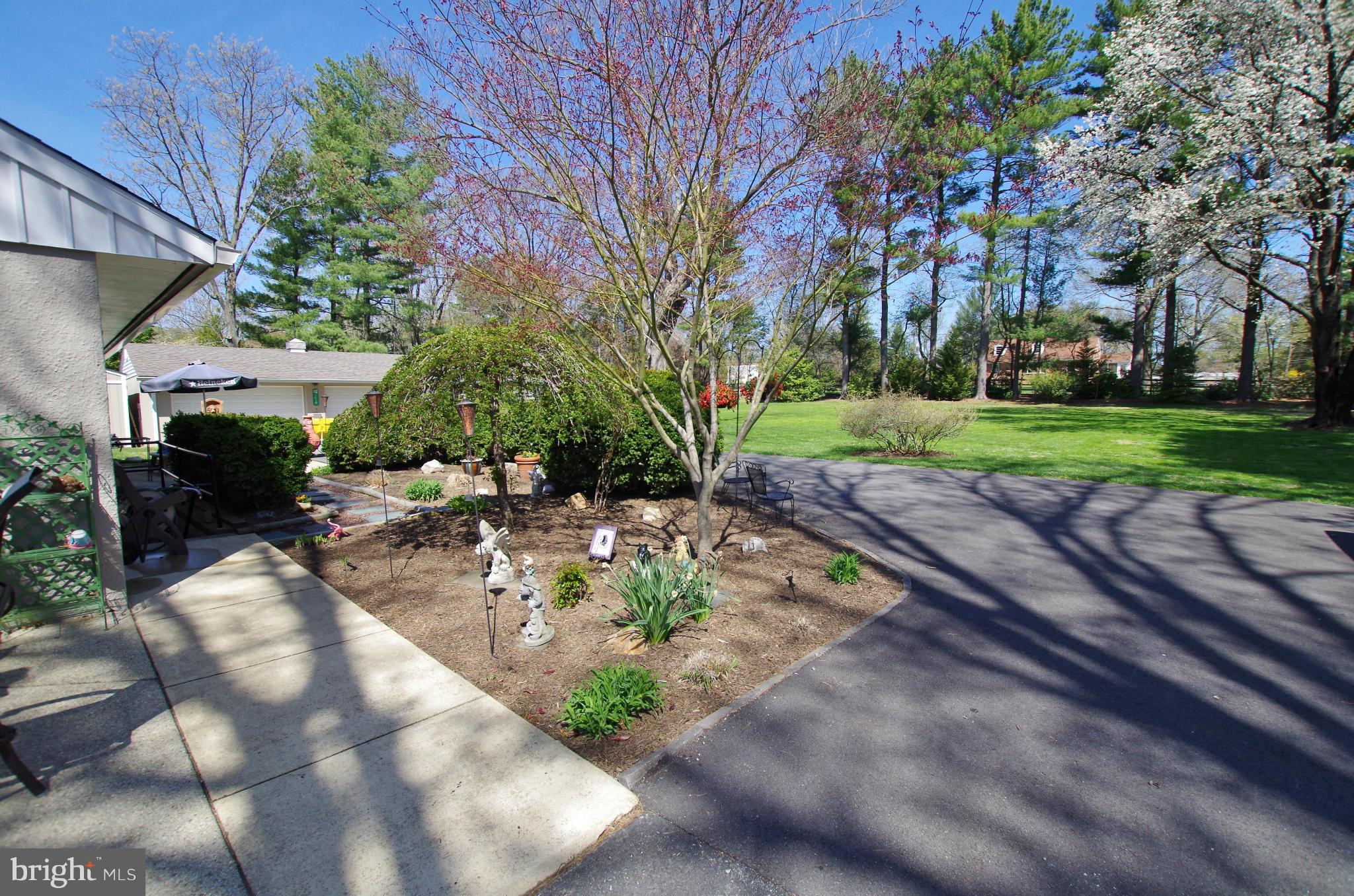 1711 Gayfields Drive Silver Spring, MD 20906 - Photo 26 of 30 Driveway Wraps Around Home to Backyard