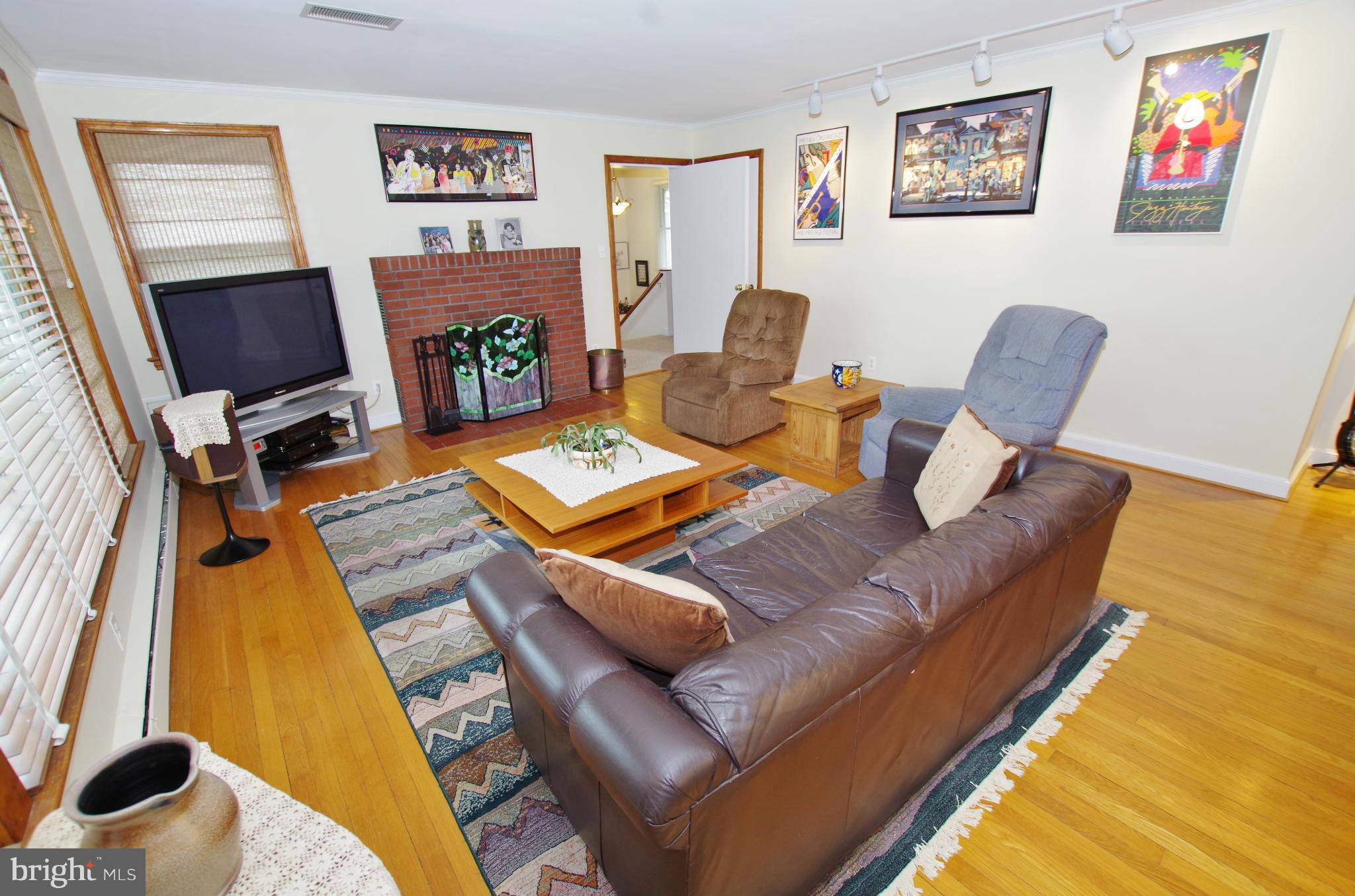 1711 Gayfields Drive Silver Spring, MD 20906 - Photo 5 of 30 Living Room with Wood Burning Fireplace