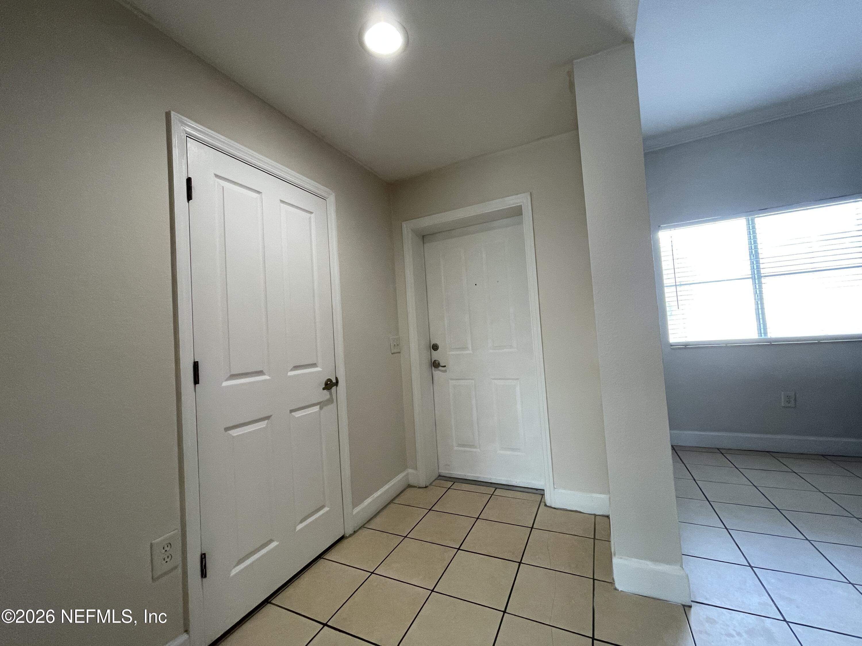 9745 Touchton Road, Unit 1826 Jacksonville, FL 32246 - Photo 16 of 56 16 foyer