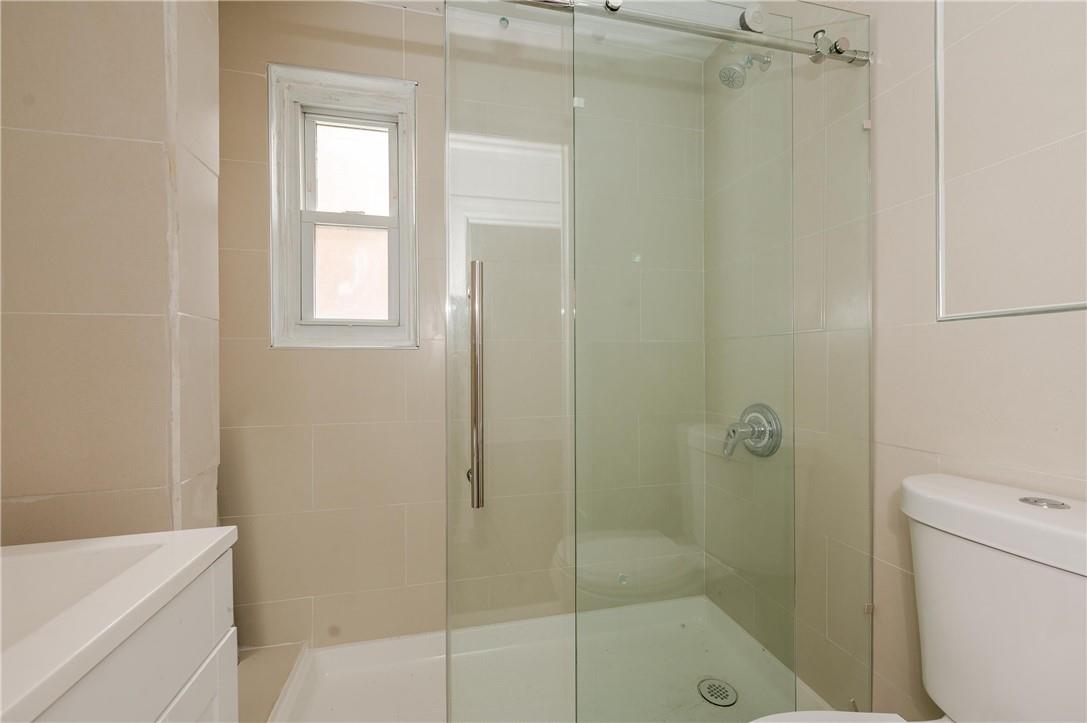 2855 Middletown Road Bronx, NY 10461 - Photo 6 of 19 a bathroom with a shower and a toilet