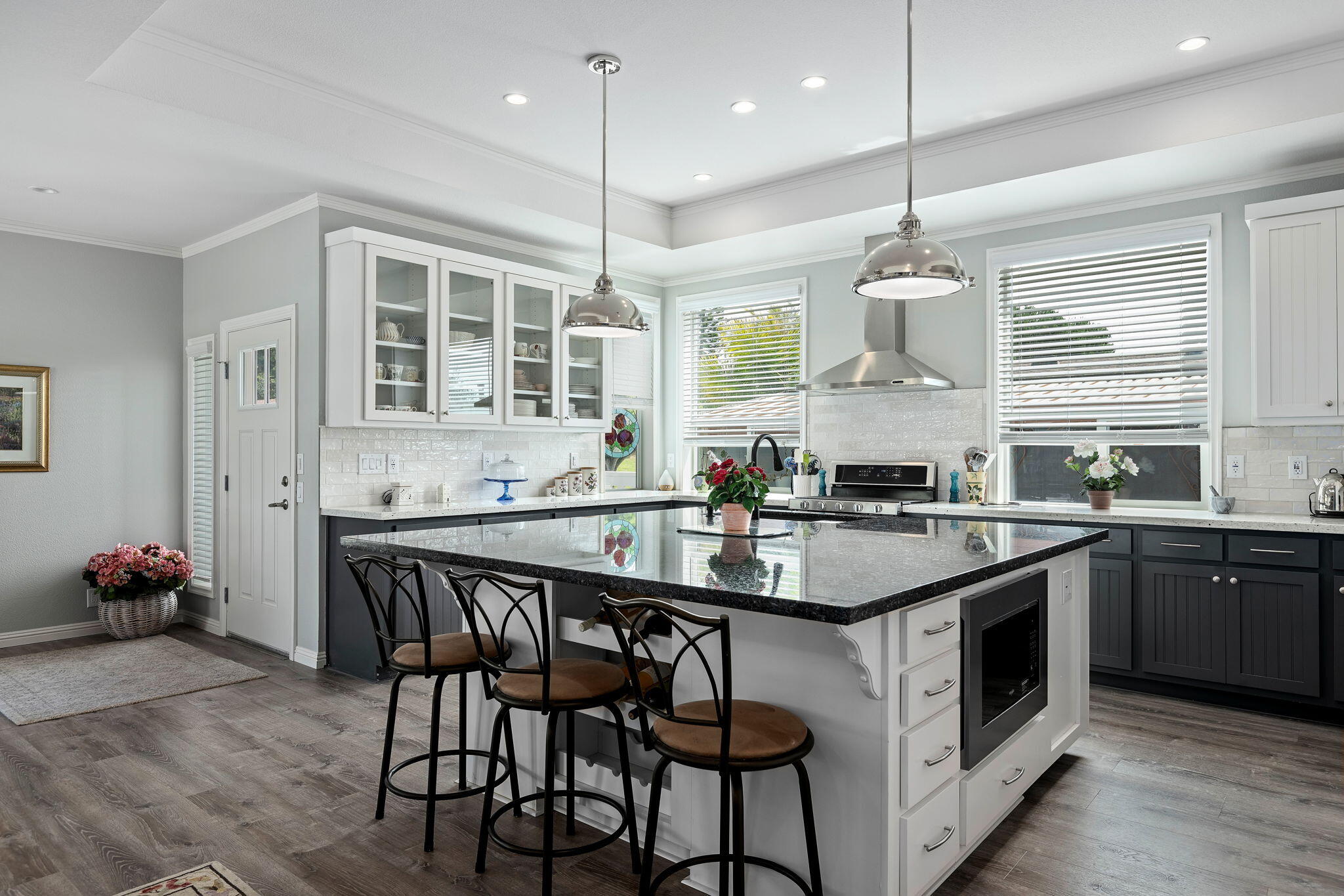 340 Old Mill Road, Unit 237 Santa Barbara, CA 93110 - Photo 13 of 30 a kitchen with granite countertop a sink and cabinets