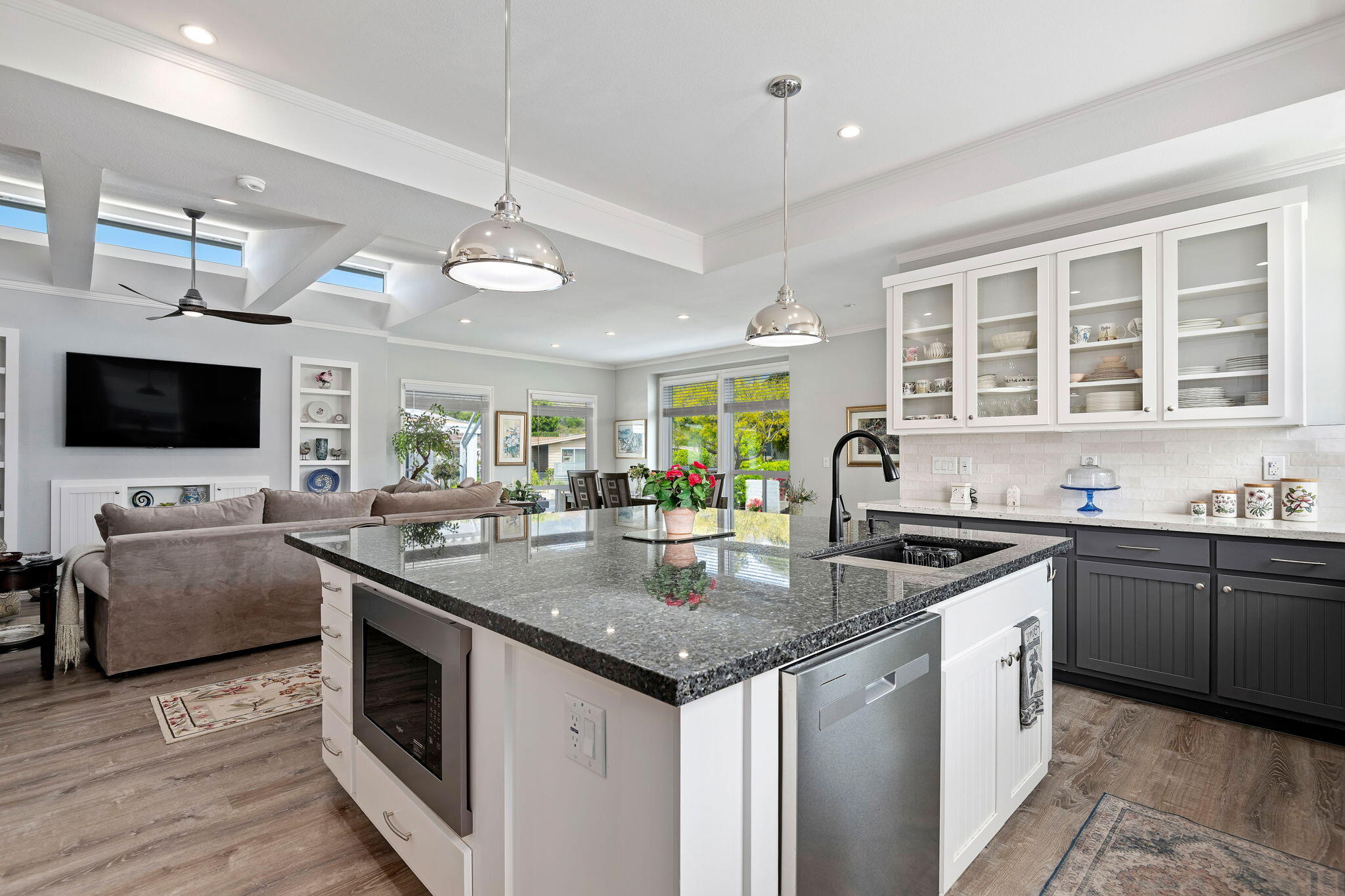 340 Old Mill Road, Unit 237 Santa Barbara, CA 93110 - Photo 14 of 30 a kitchen with stainless steel appliances granite countertop a stove and a sink
