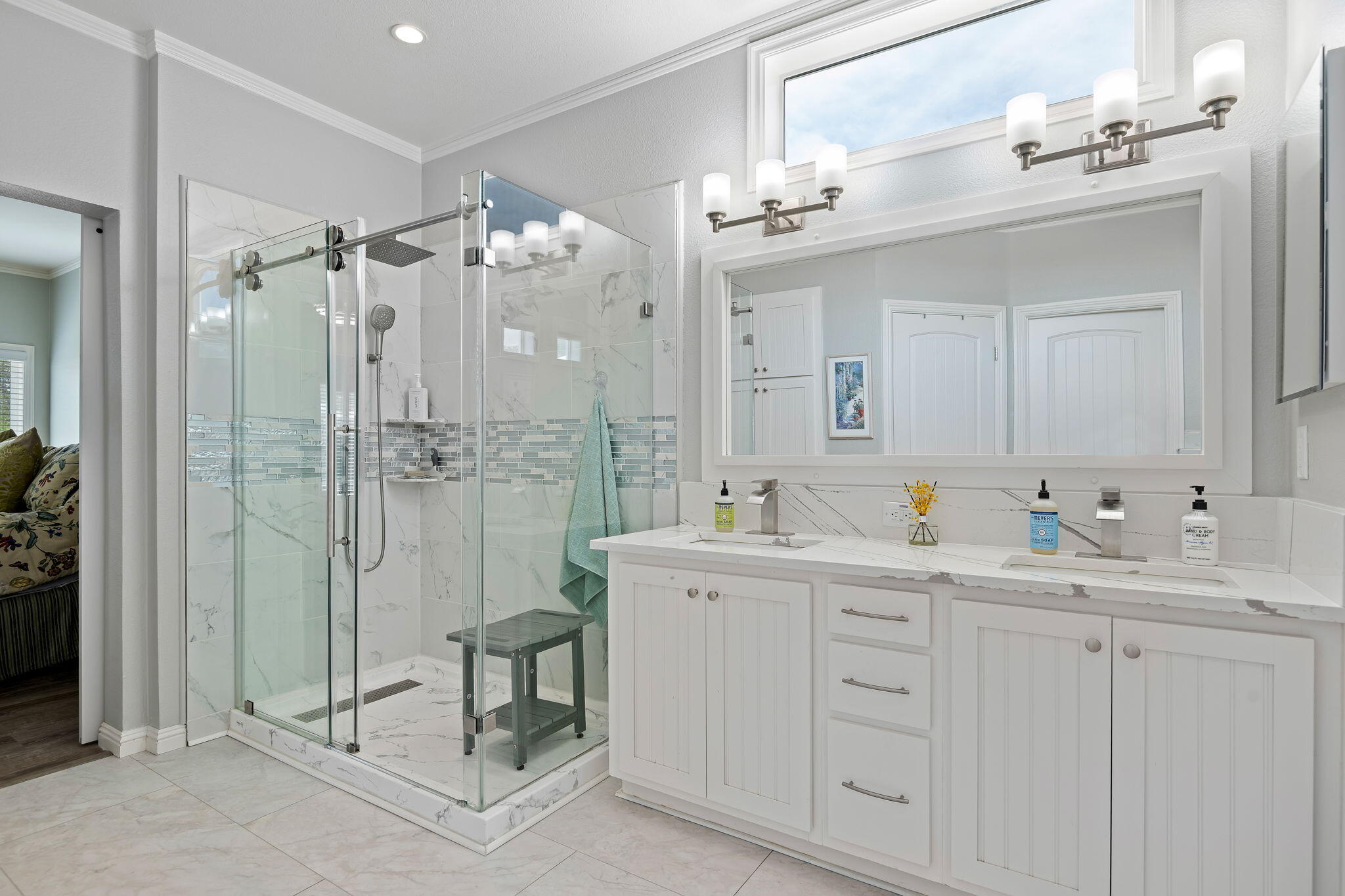 340 Old Mill Road, Unit 237 Santa Barbara, CA 93110 - Photo 18 of 30 a bathroom with a double vanity sink mirror and double