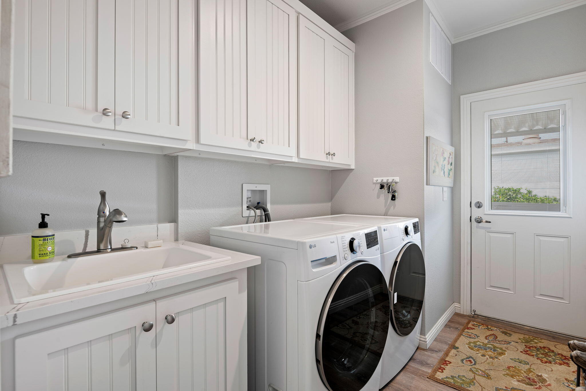 340 Old Mill Road, Unit 237 Santa Barbara, CA 93110 - Photo 23 of 30 a utility room with sink dryer and washer