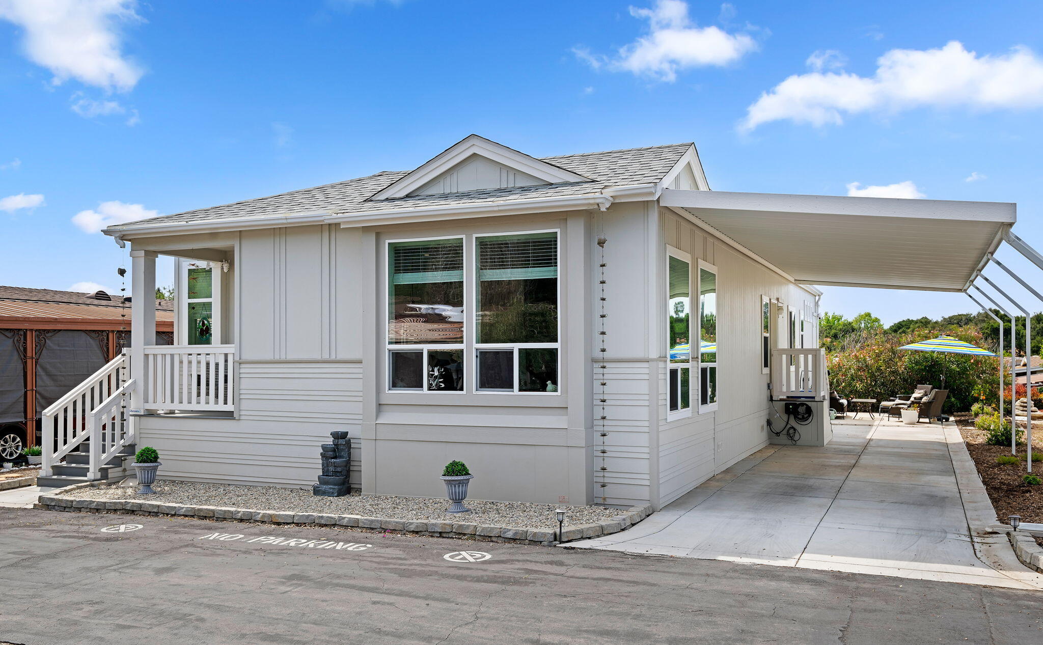 340 Old Mill Road, Unit 237 Santa Barbara, CA 93110 - Photo 3 of 30 front view of a house with a yard