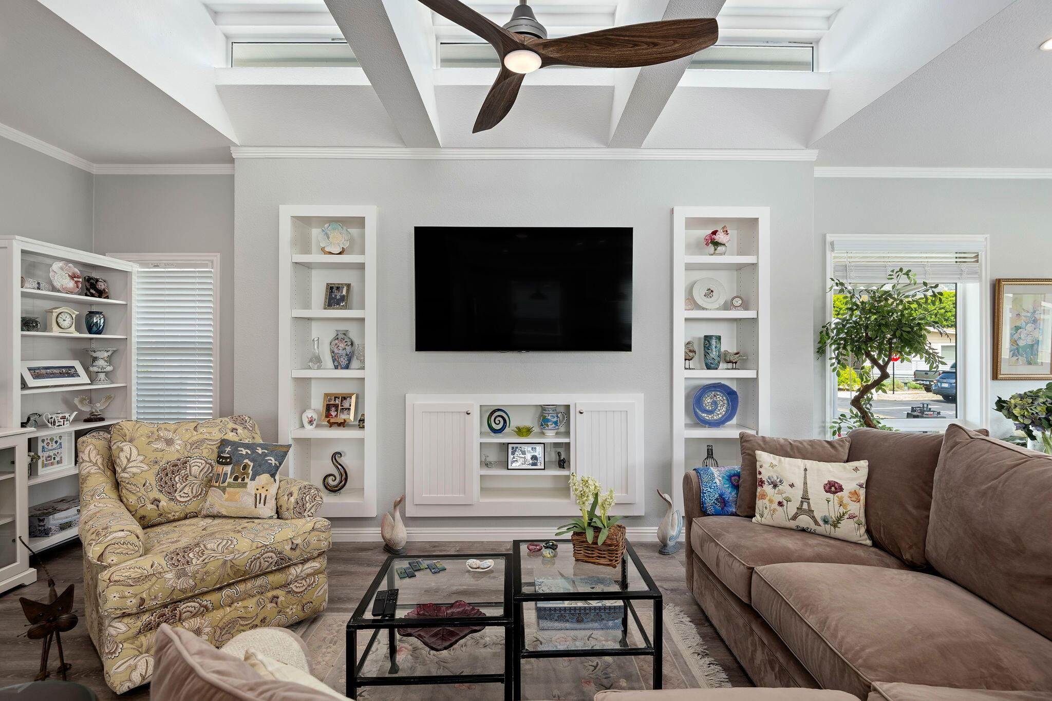 340 Old Mill Road, Unit 237 Santa Barbara, CA 93110 - Photo 7 of 30 a living room with furniture a flat screen tv and a fireplace