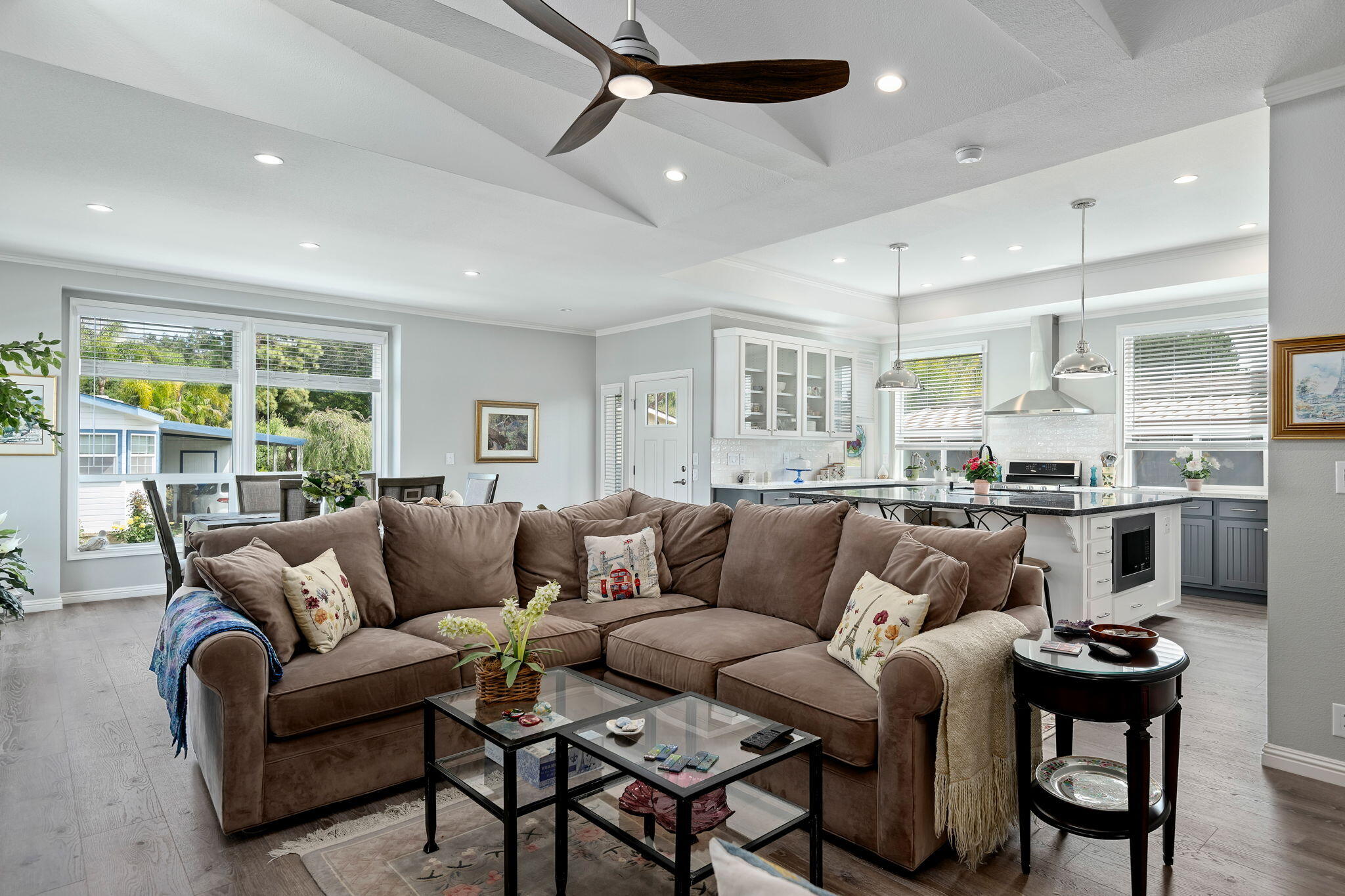 340 Old Mill Road, Unit 237 Santa Barbara, CA 93110 - Photo 8 of 30 a living room with furniture kitchen view and a large window