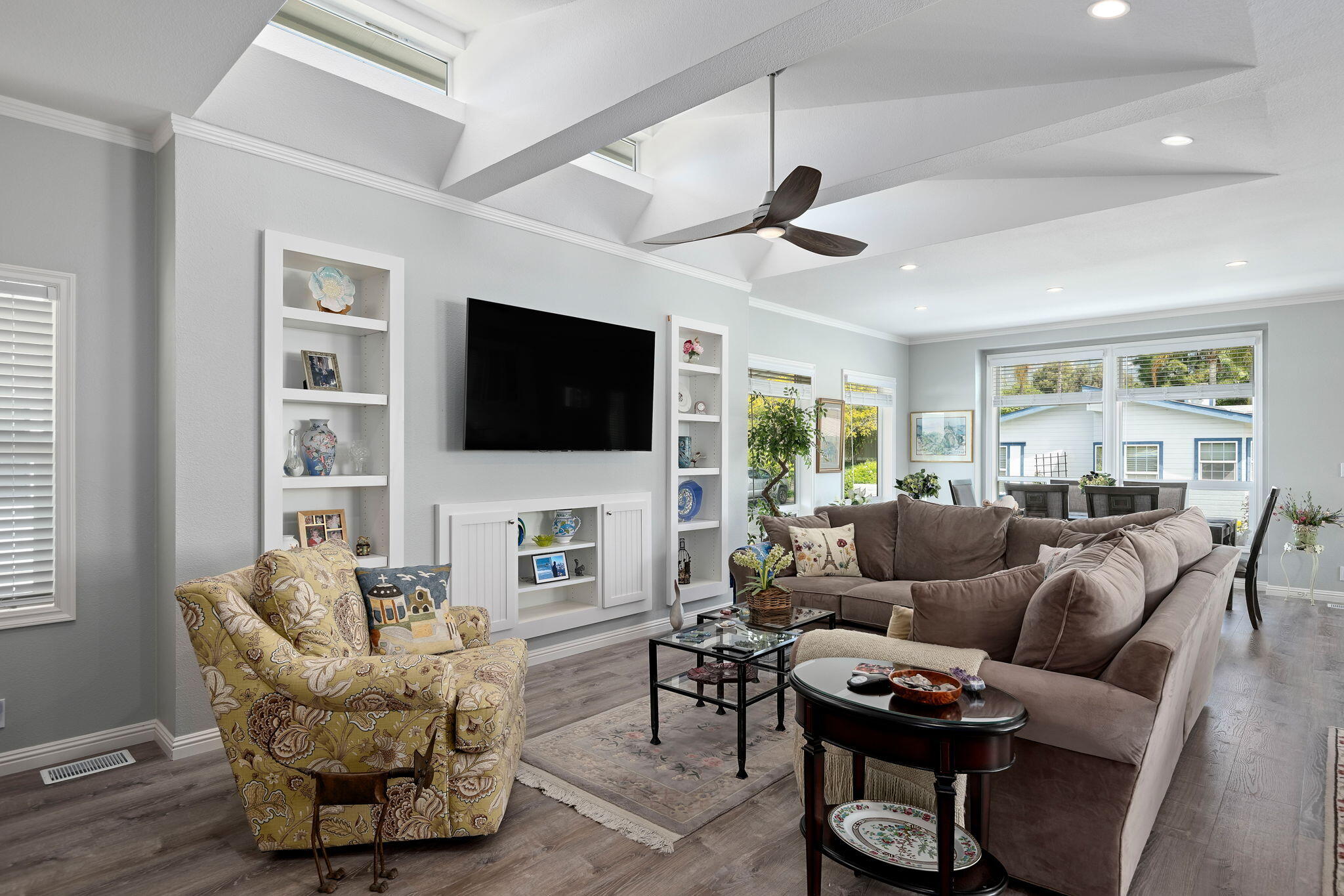 340 Old Mill Road, Unit 237 Santa Barbara, CA 93110 - Photo 9 of 30 a living room with furniture a flat screen tv and a large window