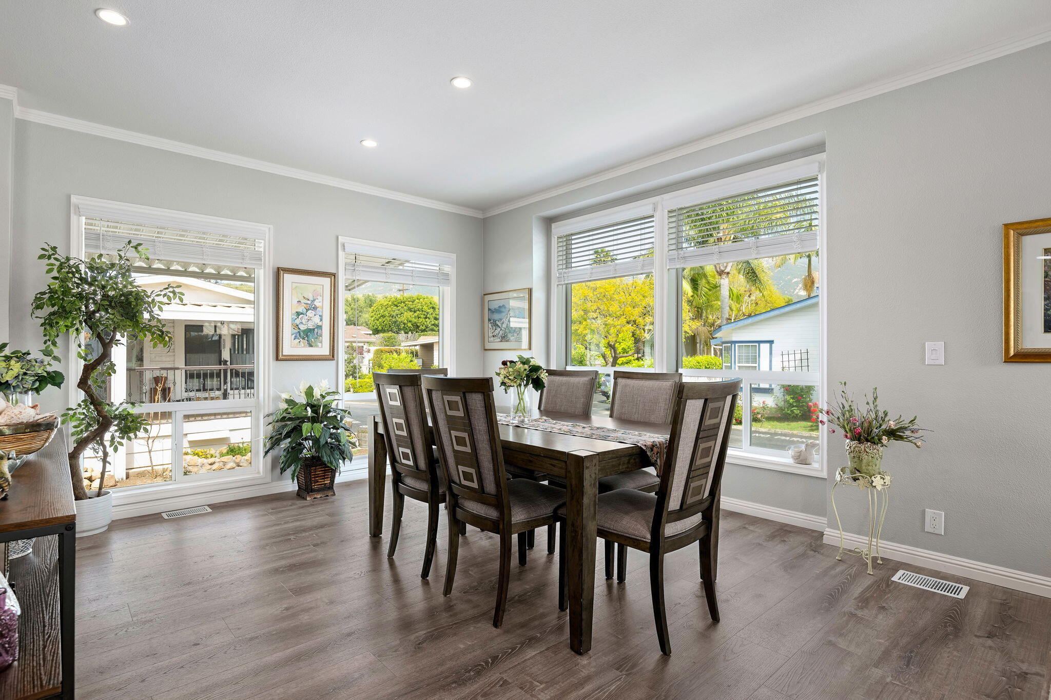 340 Old Mill Road, Unit 237 Santa Barbara, CA 93110 - Photo 10 of 30 a view of a dining room with furniture and wooden floor