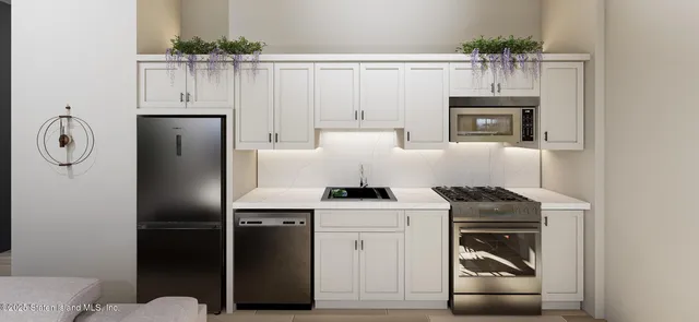 a kitchen with a refrigerator sink and cabinets