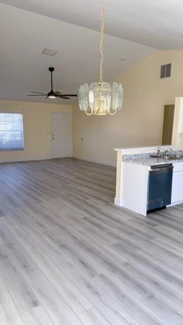 4262 Southwest Jared Street Port St. Lucie, FL 34953 - Photo 2 of 29 a view of a room with a chandelier