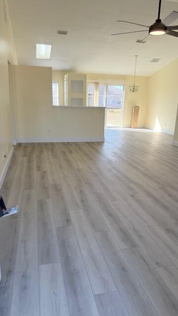 4262 Southwest Jared Street Port St. Lucie, FL 34953 - Photo 5 of 29 a view of a room with wooden floor and stairs