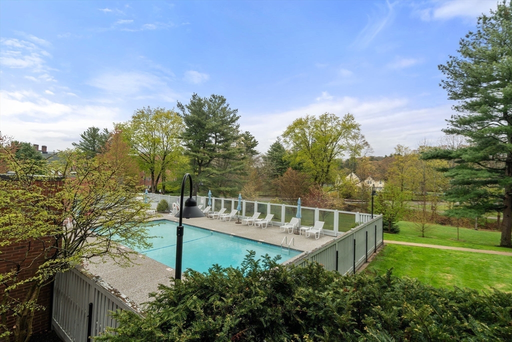 75 Grove Street, Unit 227 Wellesley, MA 02482 - Photo 28 of 29 a house view with a garden space