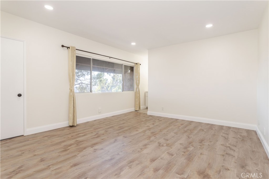 7809 Vía Udine Burbank, CA 91504 - Photo 11 of 34 a view of an empty room with a window