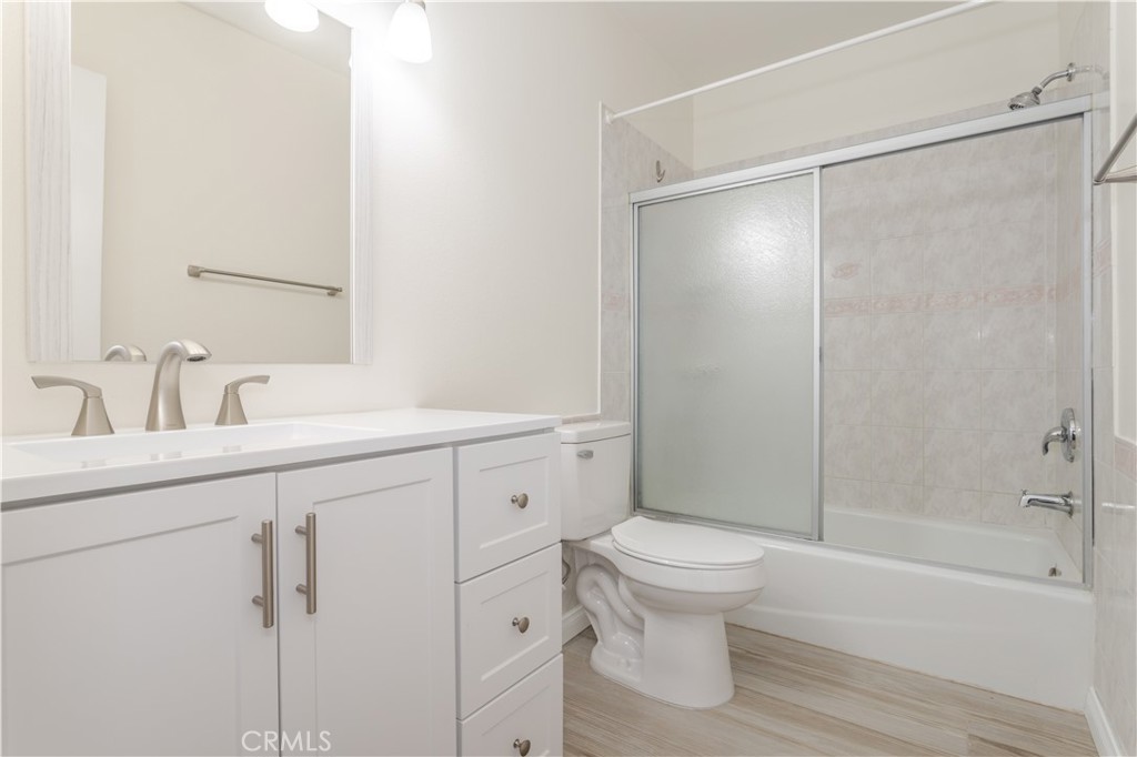 7809 Vía Udine Burbank, CA 91504 - Photo 16 of 34 a bathroom with a sink toilet and shower