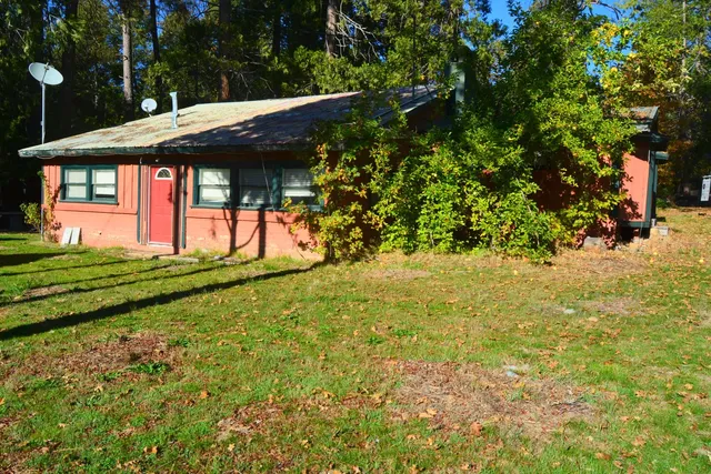 a view of swimming pool with an outdoor space and seating area