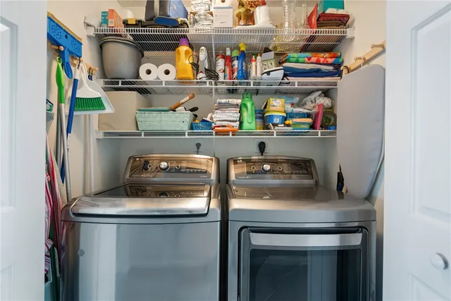 a kitchen with an oven a refrigerator and a sink