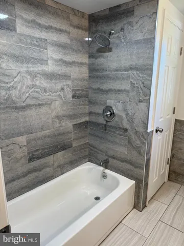 a bathroom with a bathtub