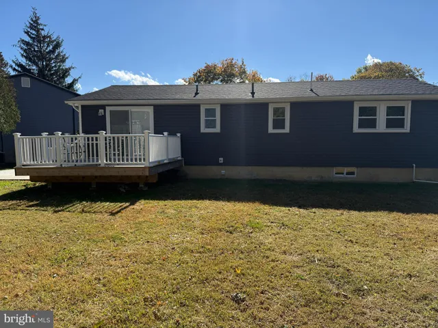 a view of a house with swimming pool