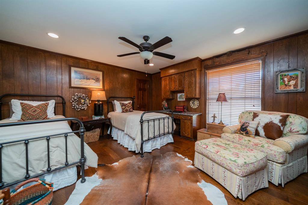 3843 Farm To Market 2199 Marshall, TX 75672 - Photo 18 of 40 a bedroom with furniture and wooden floor