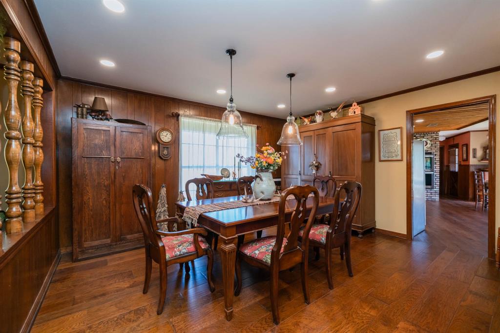 3843 Farm To Market 2199 Marshall, TX 75672 - Photo 22 of 40 a view of a a dining room with furniture window and wooden floor