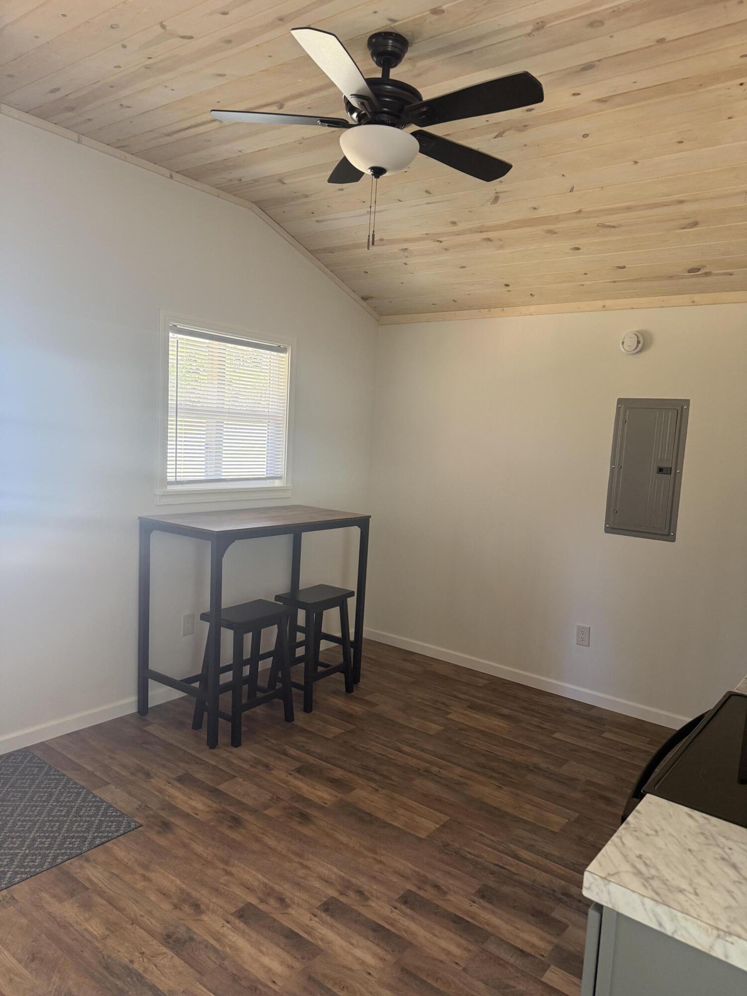 749 Brookside Drive DeFuniak Springs, FL 32433 - Photo 7 of 18 a view of a dining room with furniture and a window