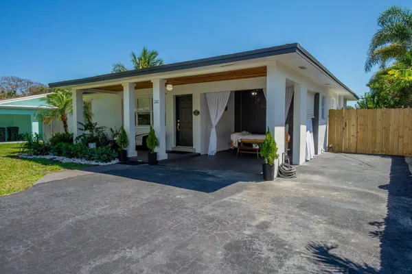a view of a house with patio