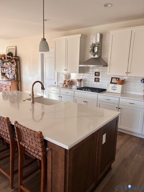 11537 Mt Hope Church Road Doswell, VA 23047 - Photo 5 of 10 a kitchen with kitchen island granite countertop a sink a center island and cabinets