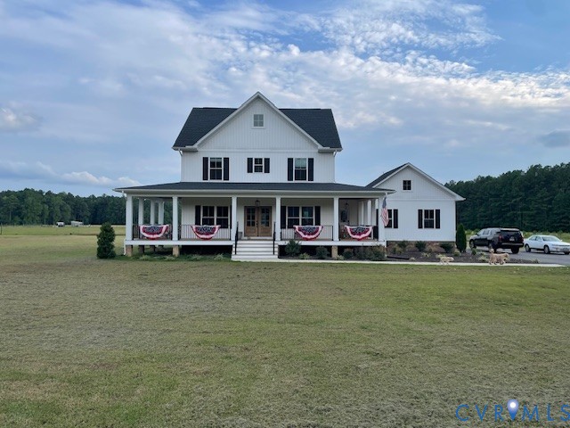 11537 Mt Hope Church Road Doswell, VA 23047 - Photo 10 of 10 a front view of a house with a garden