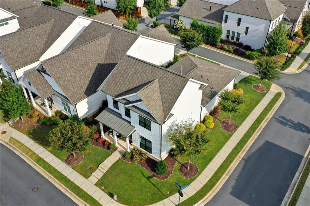 514 Homestead Park Place Canton, GA 30115 - Photo 5 of 38 an aerial view of a house with a garden and plants