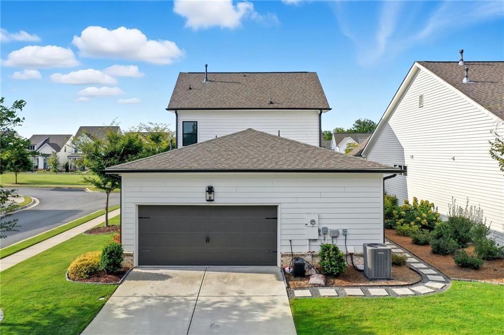 514 Homestead Park Place Canton, GA 30115 - Photo 6 of 38 a front view of house with yard