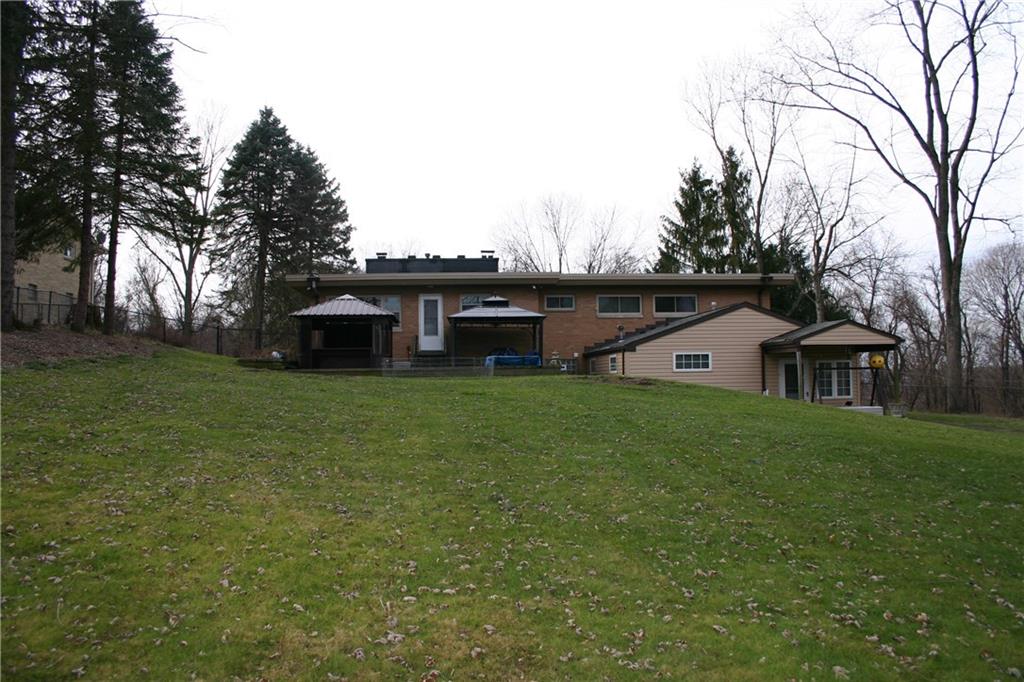 125 Dalecrest Road Penn Hills, PA 15147 - Photo 20 of 24 Rear view with the 2 Gazebos, hot tub, and the Apartment