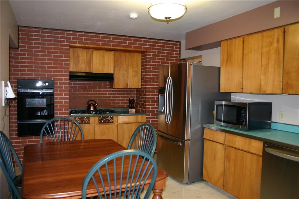 125 Dalecrest Road Penn Hills, PA 15147 - Photo 7 of 24 Eat in Kitchen with newer wall oven, gas cooktop, dishwasher