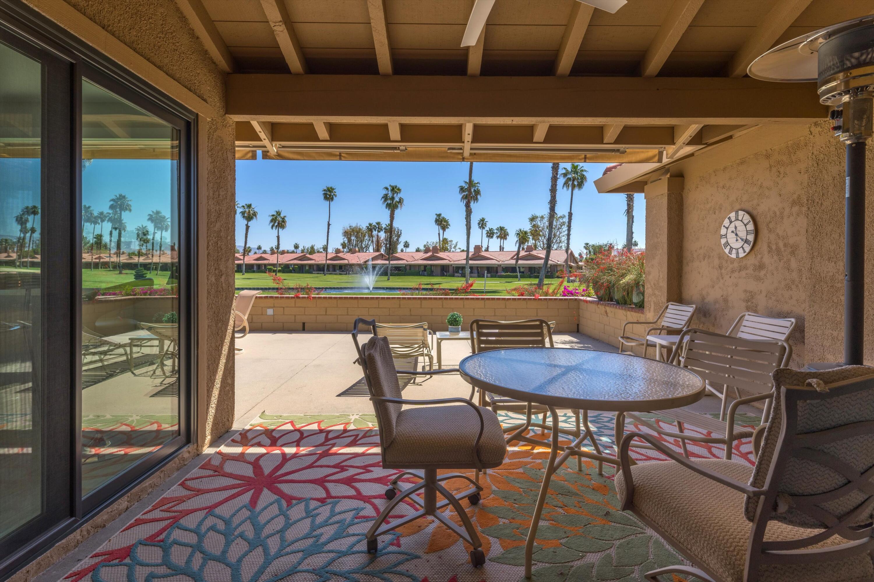 34 Maximo Way Palm Desert, CA 92260 - Photo 11 of 31 a view of a dining room with furniture window and outside view