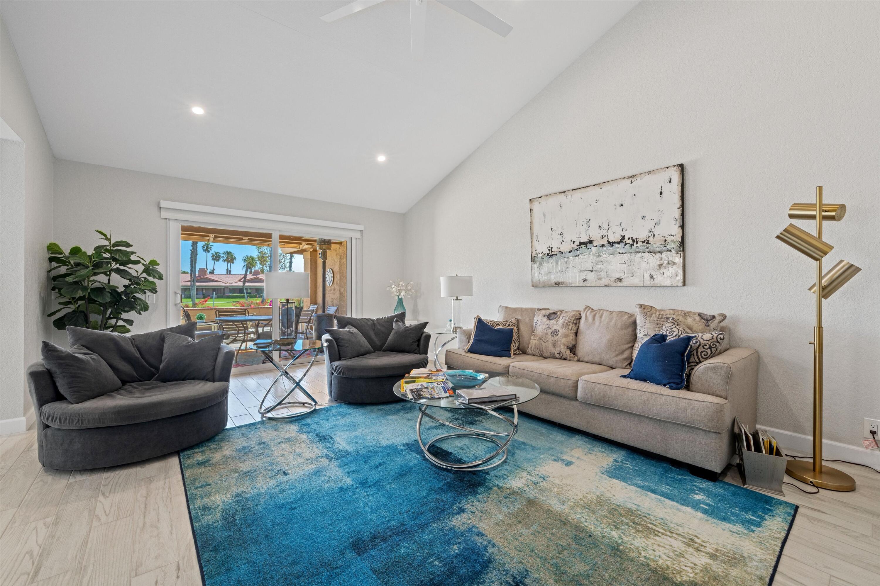 34 Maximo Way Palm Desert, CA 92260 - Photo 17 of 31 a living room with furniture and a couch