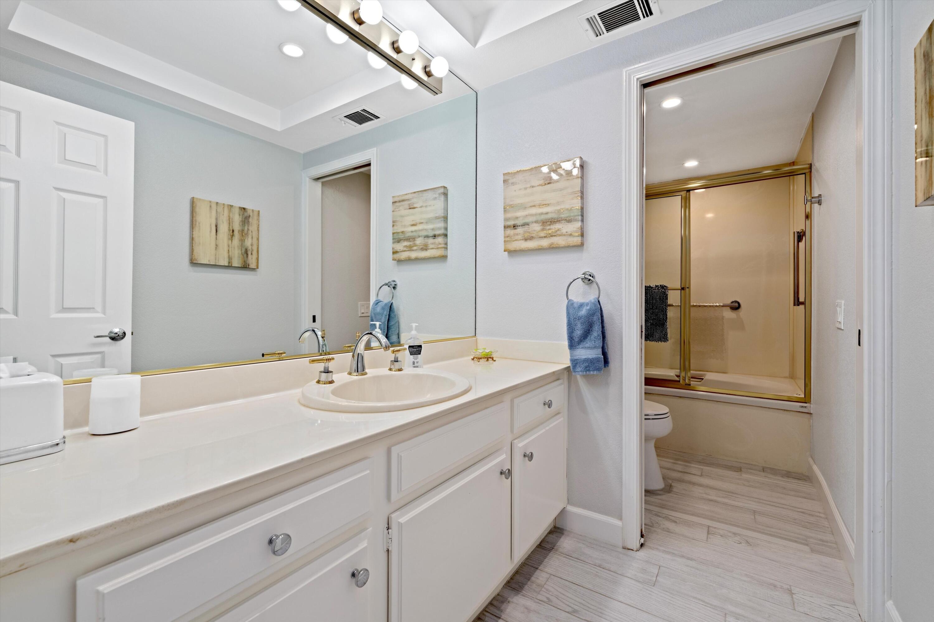 34 Maximo Way Palm Desert, CA 92260 - Photo 26 of 31 a bathroom with a sink and a mirror