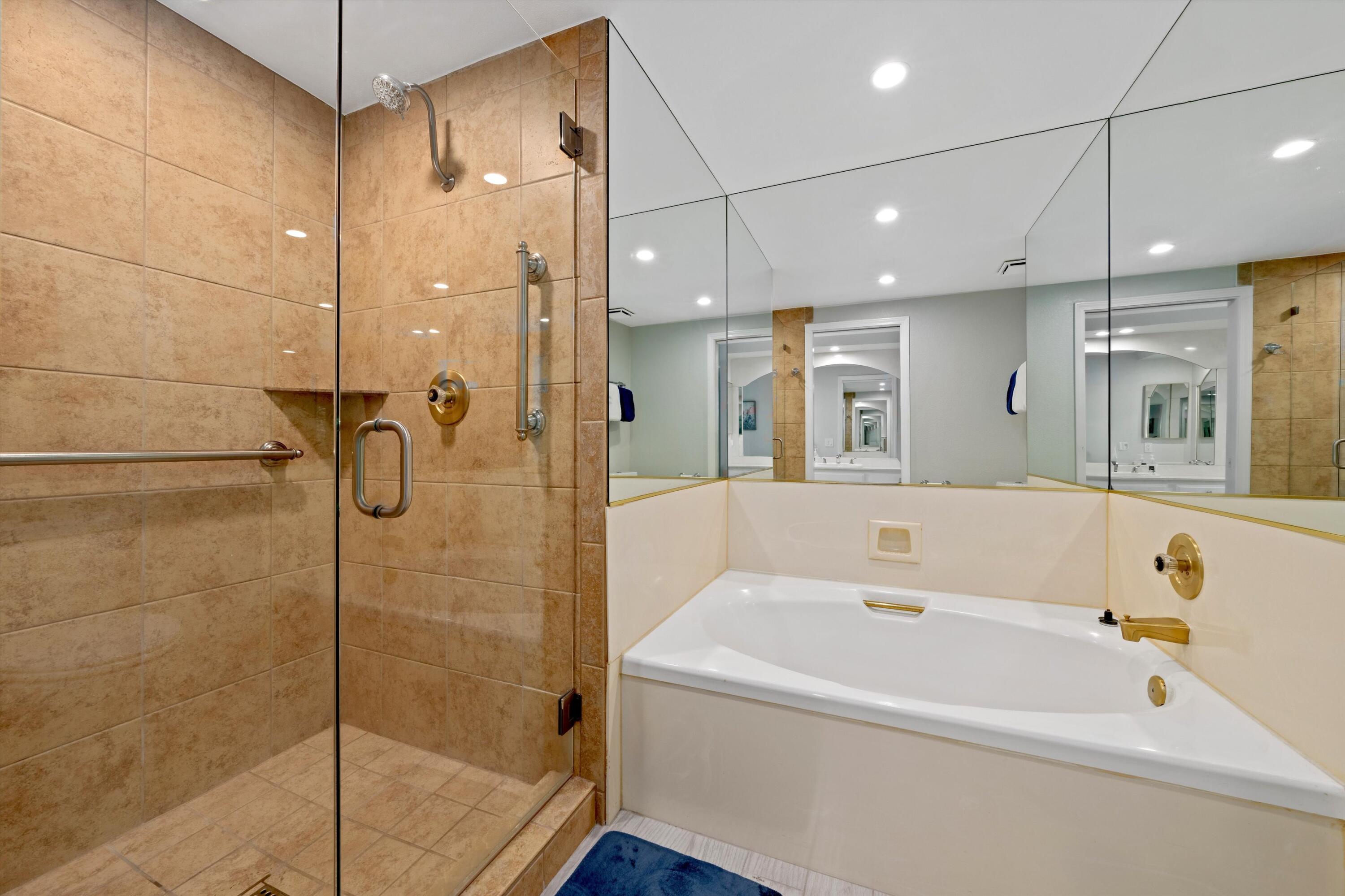 34 Maximo Way Palm Desert, CA 92260 - Photo 30 of 31 a bathroom with a bathtub and a shower