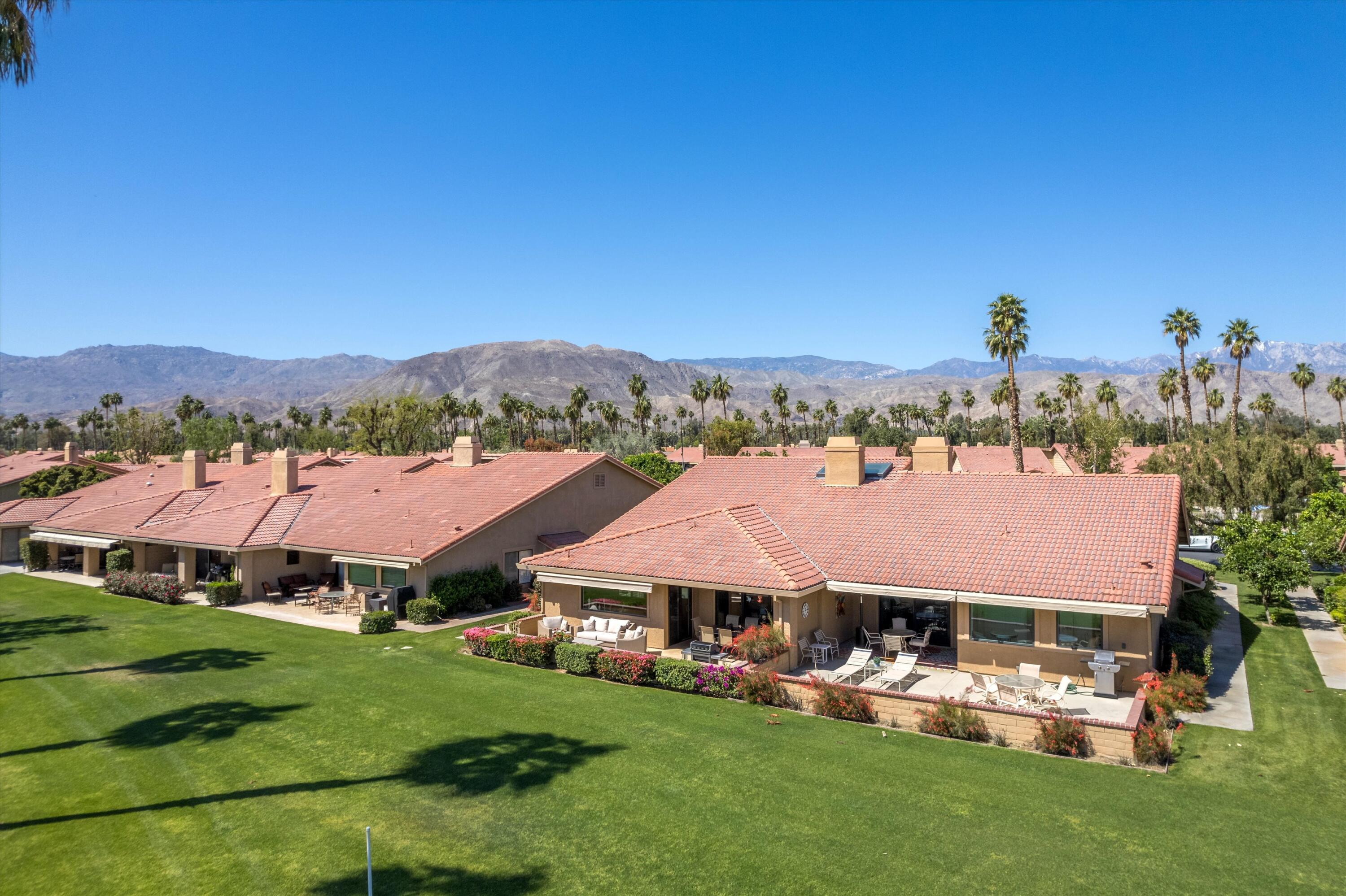 34 Maximo Way Palm Desert, CA 92260 - Photo 7 of 31 a view of a town with houses
