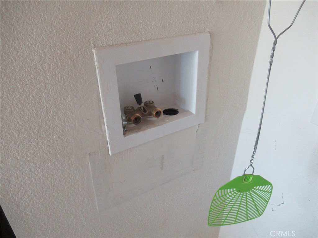 14555 Artesia Trail Santa Margarita, CA 93453 - Photo 17 of 21 a bathroom with a toilet and a mirror