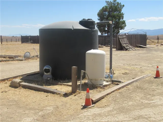 a room with a table and chairs