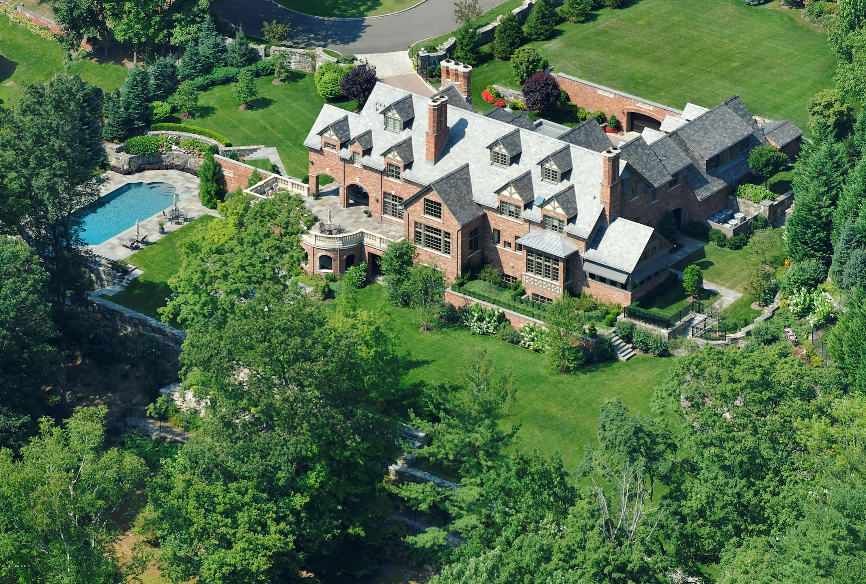 3 Jada Lane Greenwich, CT 06830 - Photo 1 of 26 an aerial view of residential house with outdoor space and trees all around