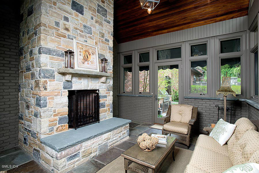 3 Jada Lane Greenwich, CT 06830 - Photo 13 of 26 a living room with furniture and a fireplace
