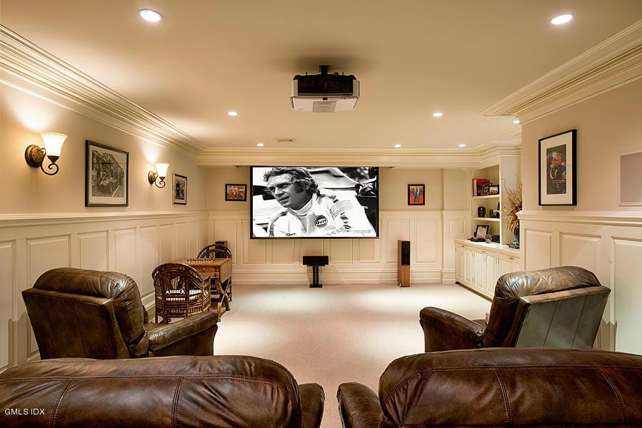 3 Jada Lane Greenwich, CT 06830 - Photo 14 of 26 a living room with furniture and a flat screen tv