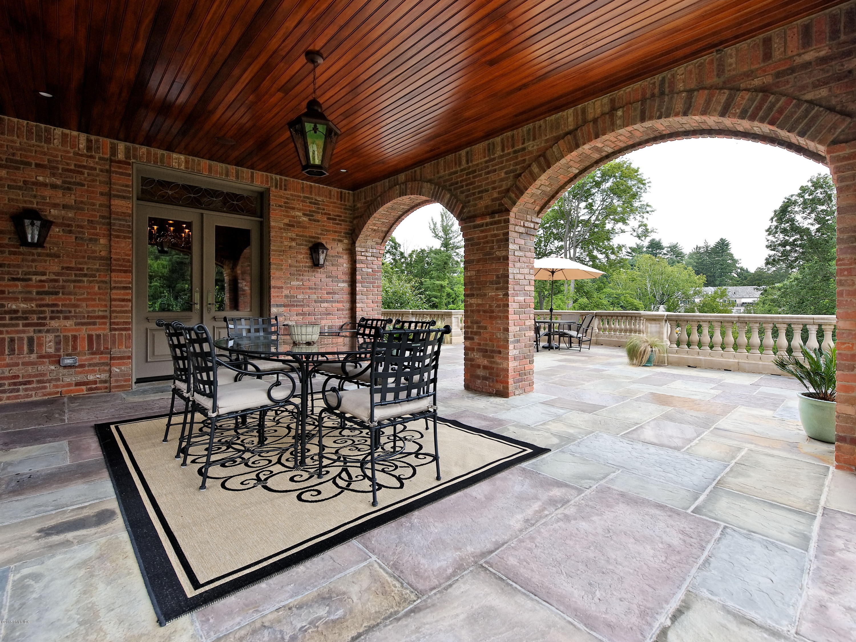 3 Jada Lane Greenwich, CT 06830 - Photo 18 of 26 a view of porch with furniture