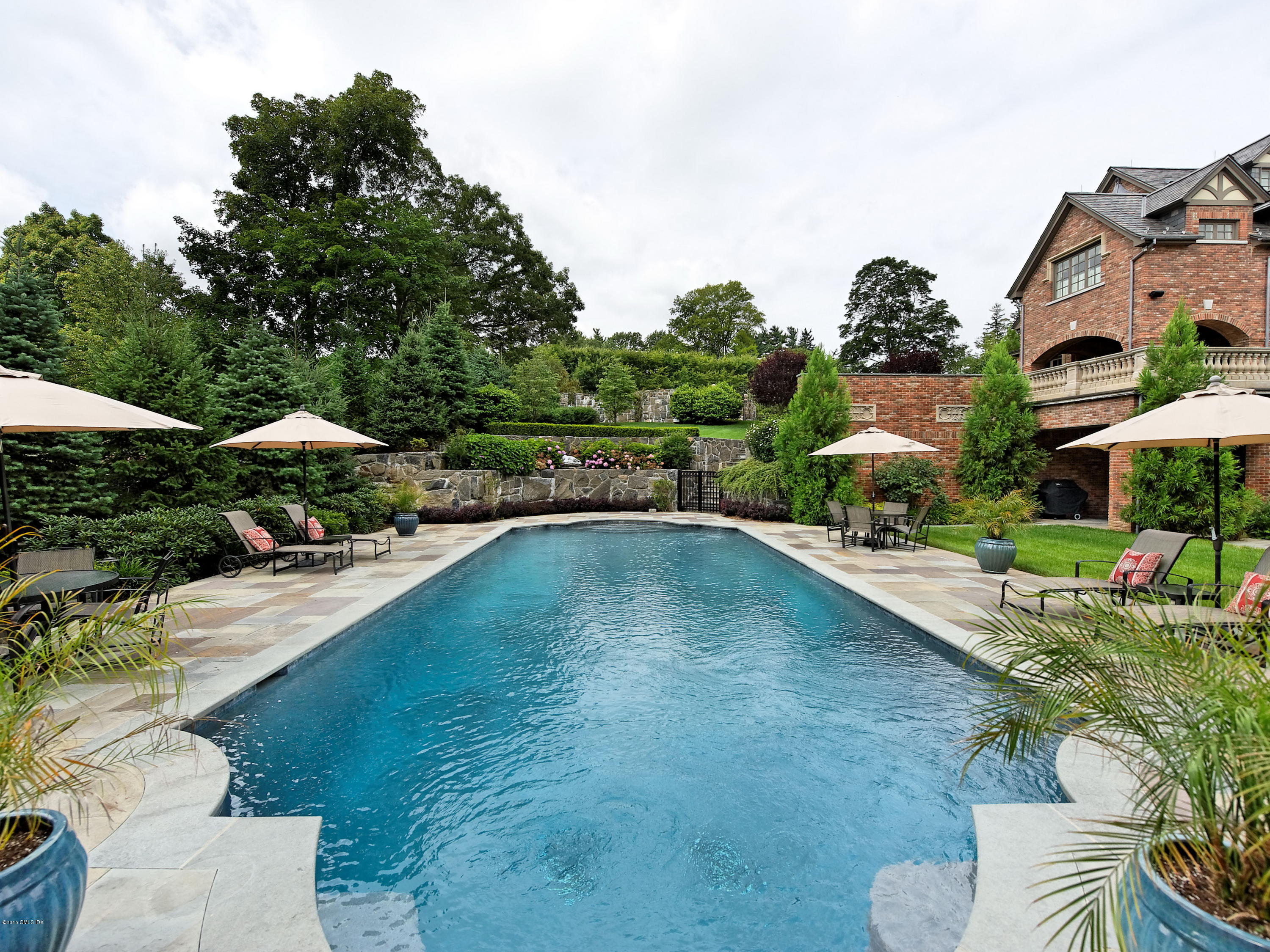 3 Jada Lane Greenwich, CT 06830 - Photo 19 of 26 a swimming pool with outdoor seating and yard