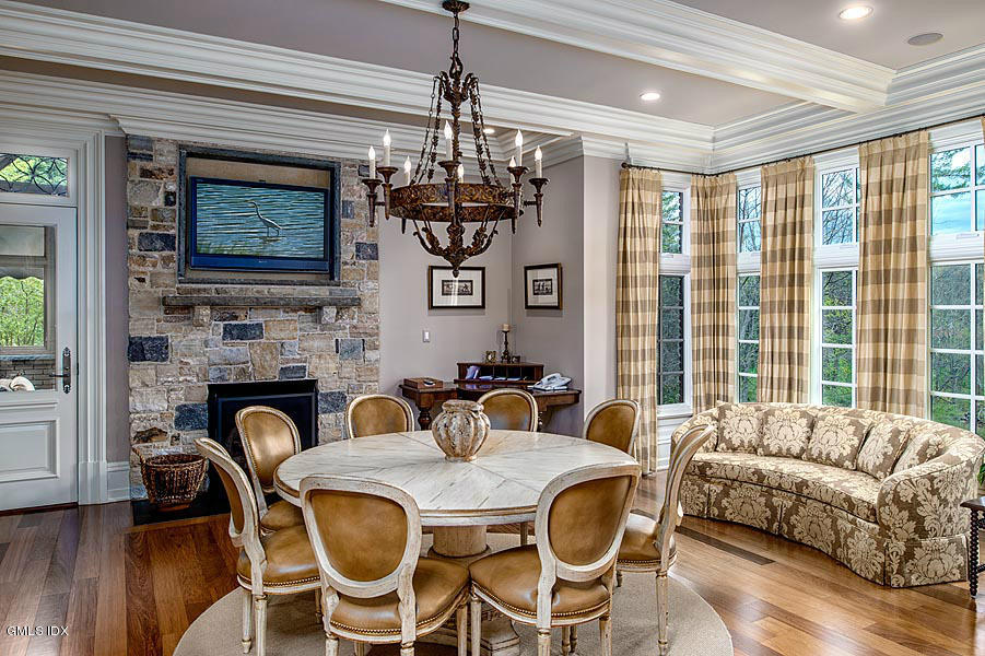 3 Jada Lane Greenwich, CT 06830 - Photo 5 of 26 a living room with fireplace furniture and a chandelier