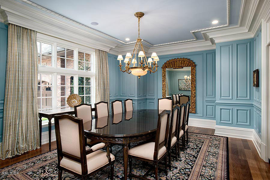 3 Jada Lane Greenwich, CT 06830 - Photo 7 of 26 a dining room with furniture a chandelier and wooden floor